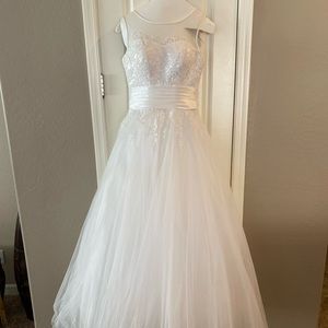 White dress with beautiful embroidery of flowers